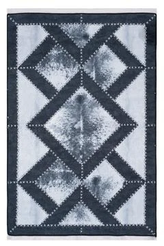 Patchwork leather rug on white background Stock Photos
