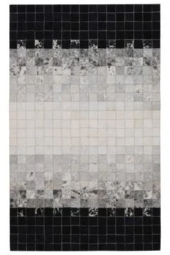 Patchwork leather rug on white background Stock Photos