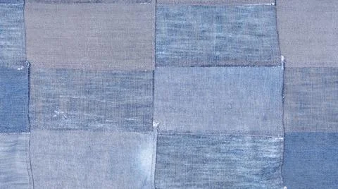 Patchwork from many old blue denim flaps textile panoramic background - pa... Foto stock