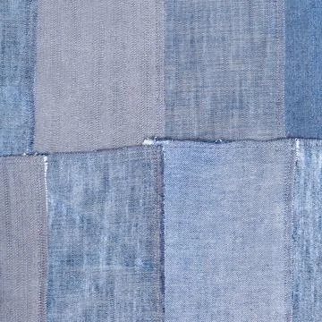 Patchwork from old denim flaps textile square background - patchwork from ... Foto stock
