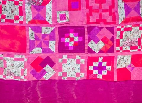 Patchwork pink cloth on hand-dyed silk base Stock Photos