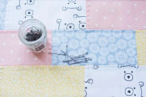 Patchwork project and glass jar 写真素材