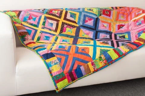 Patchwork quilt. Part of blanket as background Stock Photos