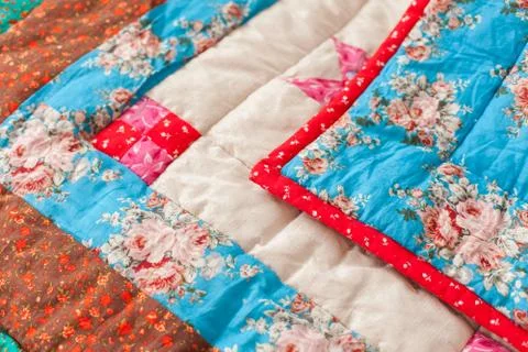 Patchwork quilt. Part of blanket as background Stock Photos