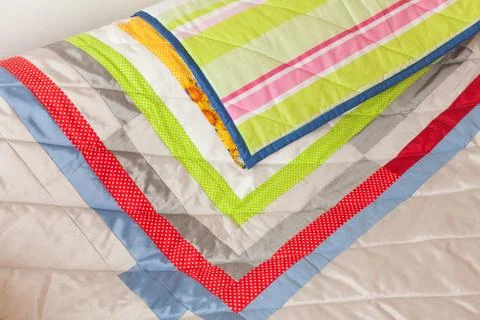 Patchwork quilt. Part of blanket as background Stock Photos