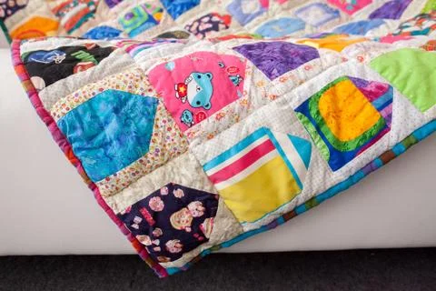 Patchwork quilt. Part of patchwork quilt as background. Handmade. Colorful Stock Photos