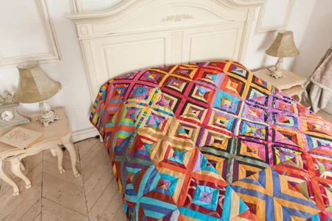 Patchwork quilt. Part of patchwork quilt as background. Handmade Stock Photos