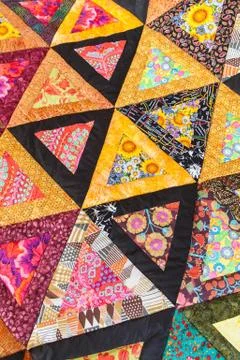 Patchwork quilt. Part of patchwork quilt as background. Handmade. Colorful Stock Photos