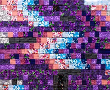 Patchwork quilt. Part of patchwork quilt as background. Flower print. Color Stock Photos