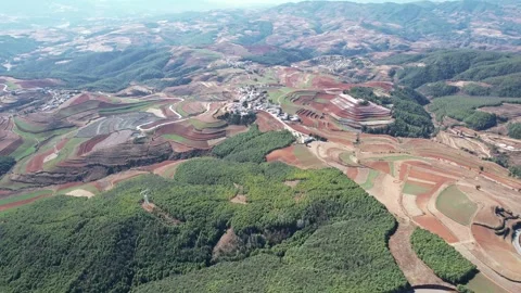 Patchwork Red Earth Fields And Reservoirs in Dongchuan, China Stock Footage 344038070