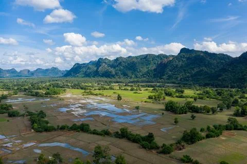 Patchwork rice fields and limestone hills in Laos 写真素材
