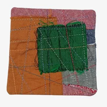 Patchwork sample detail with colorful fabric scraps 스톡 사진