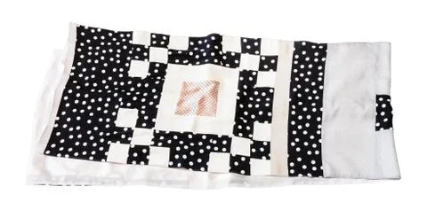 Patchwork silk scarf sewn from polka dots fabrics Stock Photos