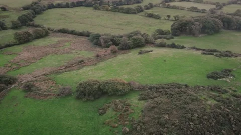 Patchwork small farmland fields, rolling rural country landscape, aerial drone Stock Footage 327241778