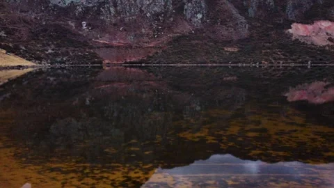 Patchwork of small Peruvian farms dry brown vegetation with small gravel road sn Video stock 251380758