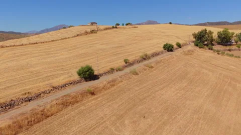 Patchwork Of Stubble Fields Below Distant Mountains Stock Footage 348741878