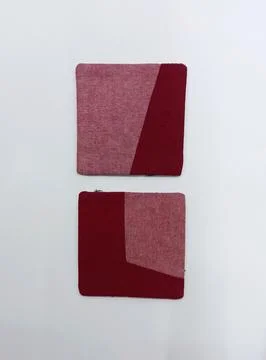 Patchwork textile coaster handmade craft reverse side Stock Photos