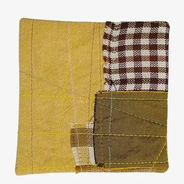 Patchwork textile square with contrasting patterns Foto stock