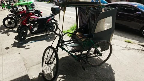 Patchwork Tricycle Cab Reflecting Resilience And Inventive Island Traditions Stock-Footage 336339673