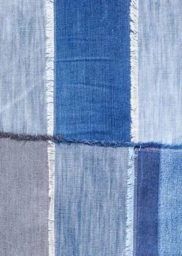 Patchwork from various blue denim flaps close up textile background - patc... Foto stock