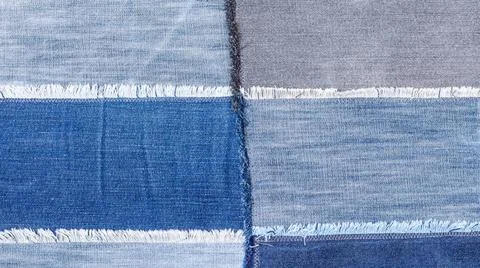 Patchwork from various denim flaps close up textile panoramic background -... Foto stock
