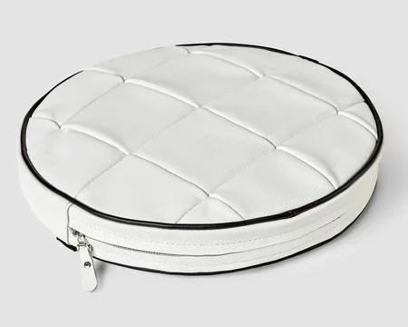 Patchwork white leather round floor cushion with hidden zipper Stock Photos