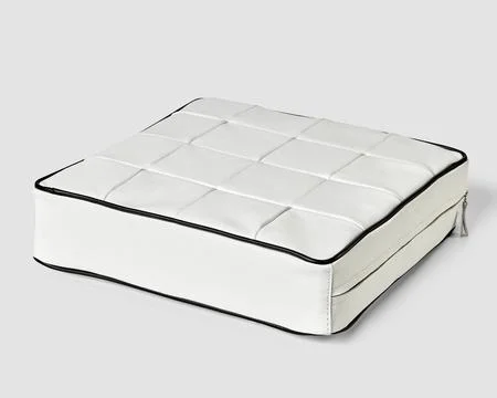 Patchwork white leather square floor cushion with hidden zipper Stock Photos