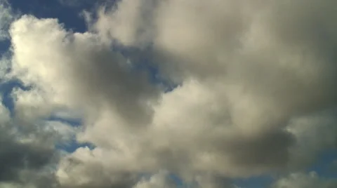 Patchy Clumps of Clouds Drifting Gently Video stock 41391880