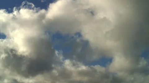 Patchy Clumps of Clouds Floating By Video stock 41391839