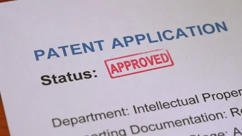 Patent Application Approved Stamp Coming Down on Form Stock Footage 342025044
