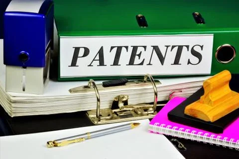 Patents files in folders, a security document certifying the official Stock Photos