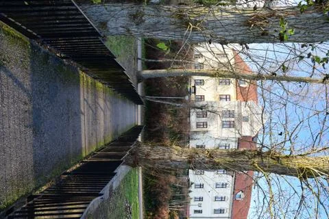 A path across the bridge leads to the old castle. Stock Photos