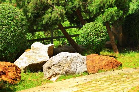 The path along the boulders Stock Photos