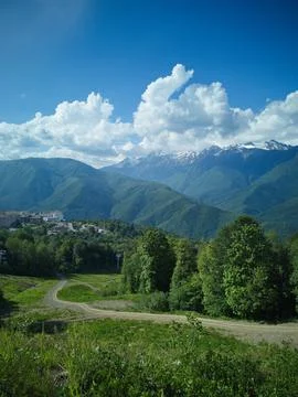 Path among the mountains Stock Photos