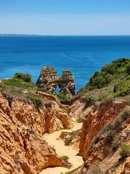 Path among the rocks on a cliff Stock Photos