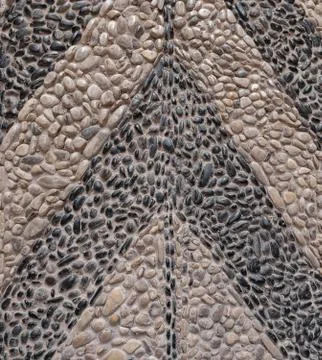 Path with an ancient pattern of pebbles. Texture Foto stock