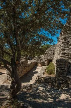 Path and huts made of stone in the Village of Bories near Gordes. Stock Photos