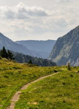 A path and a marker in the Mountains Stock Photos