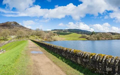 Path and stone wall surround Bottoms Reservoir Stock Photos