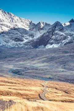 Path and winter scenery in the mountains - snow covered rocky summits of Cuil Stock Photos