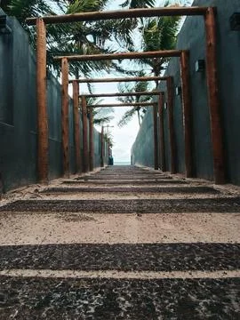 Path to a beach and sea view Stock Photos