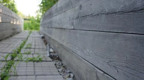 The path between the beds, paving stones in the garden Stock Photos