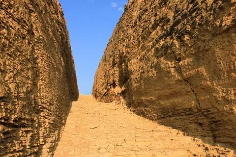 The path between the rocks to the caves. Ancient dwellings. Azerbaijan. Shema Stock Photos