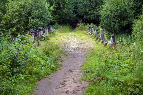 The path to the Big white stone bridge in the park of the Serednikovo estate Stock Photos