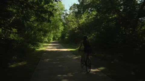 Path Biking Wide Tracking 3 Stock Footage 134736261