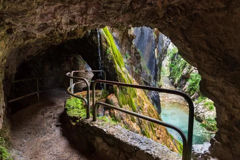 Path of the Cares river, road built in the rock based on tunnels, in the gorg Stock Photos