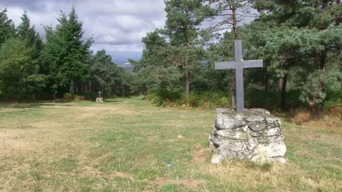 PATH WITH CROSSES WITH THE MOVING LIGHT OF THE SUN Stock Footage 96285179