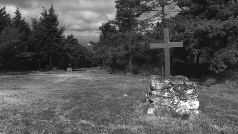 PATH WITH CROSSES IN WHITE AND BLACK WITH THE MOVING LIGHT OF THE SUN Stock Footage 96285868
