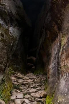 The path to the dark mysterious cave Foto stock
