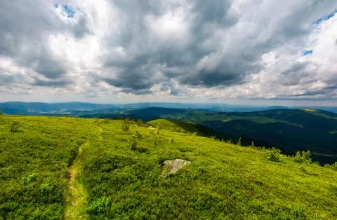 Path down the hill among the rocks Stock Photos